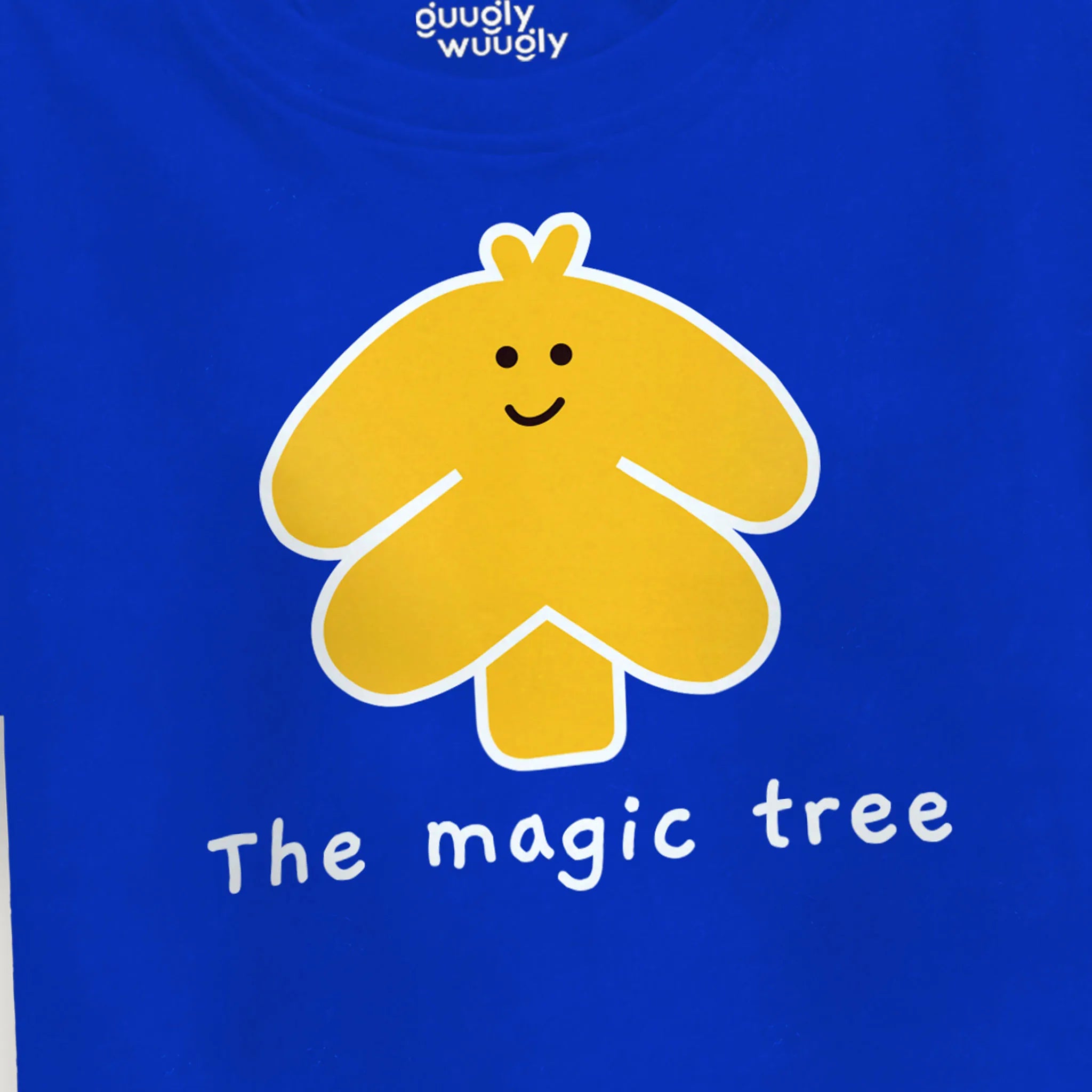 Close-up of the Girls Magic Tree Crop Top in Classic Blue highlighting the detailed tree print and soft fabric.