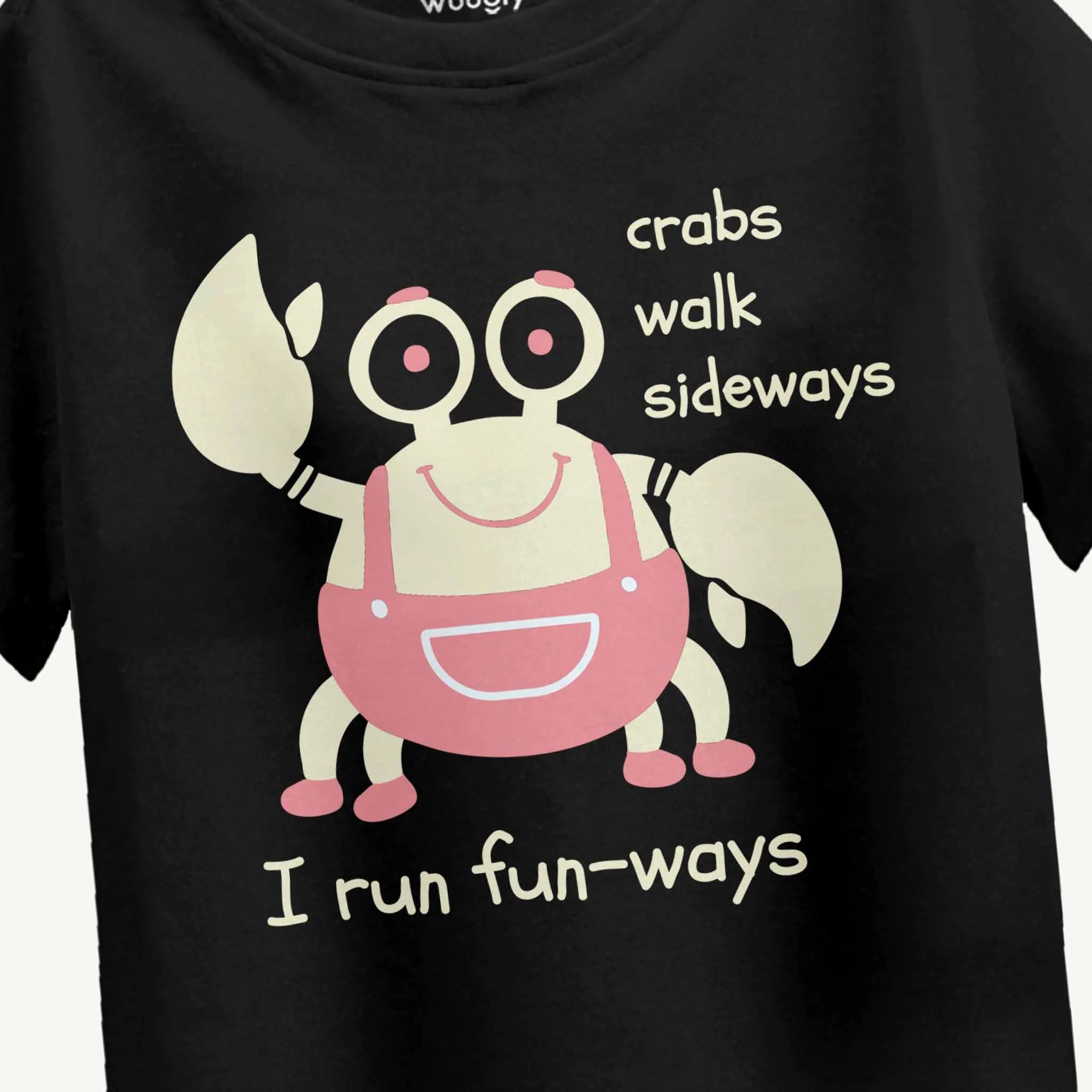 Black t-shirt with a cartoon crab and humorous text on a plain background