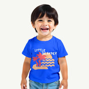 Child wearing a blue t-shirt with a colorful graphic design on a white background