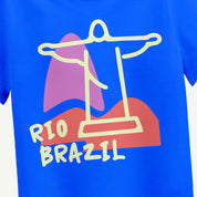 Blue t-shirt with a colorful graphic of the Christ the Redeemer statue and 'Rio Brazil' text on a white background.
