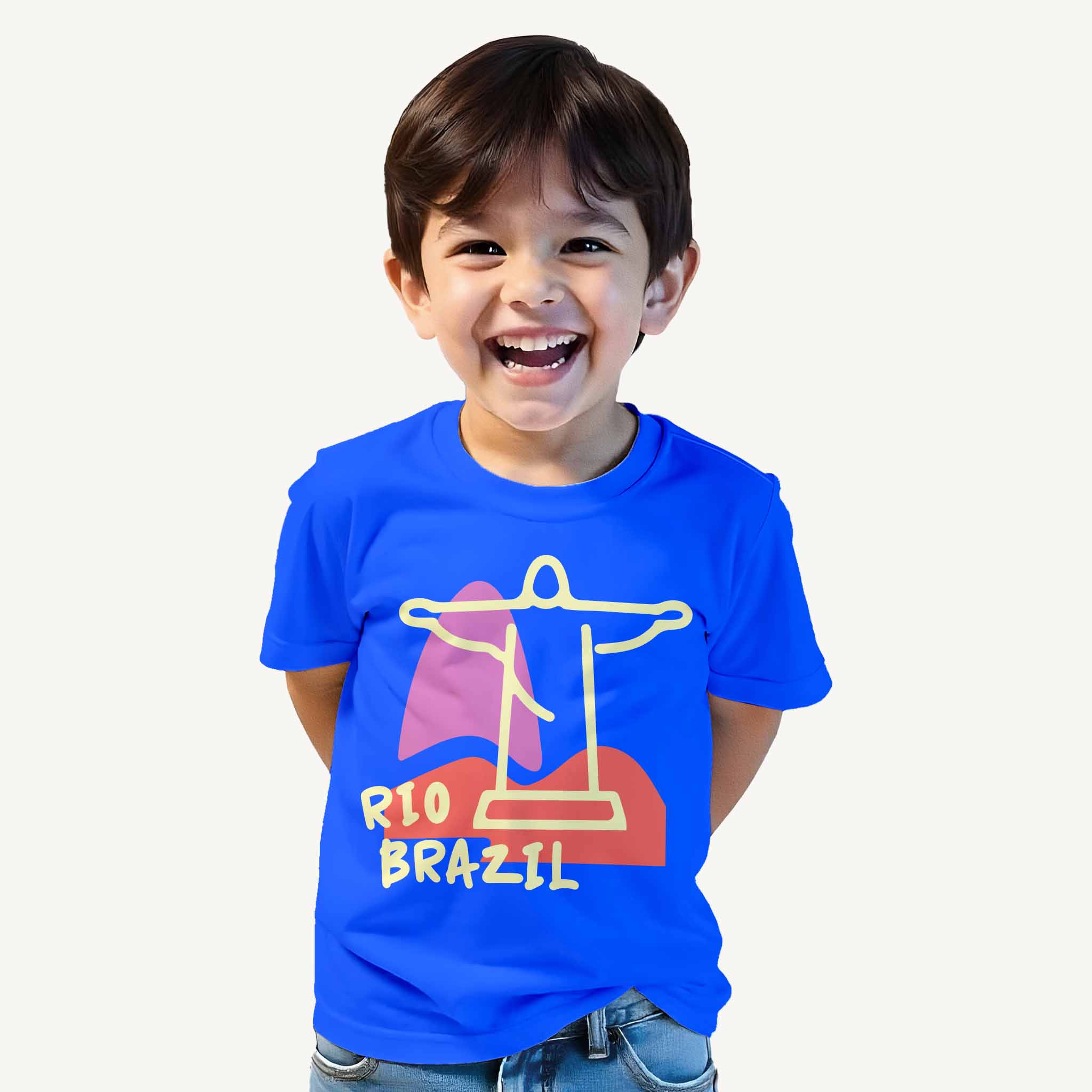 Child wearing a blue t-shirt with 'Rio Brazil' design on a white background