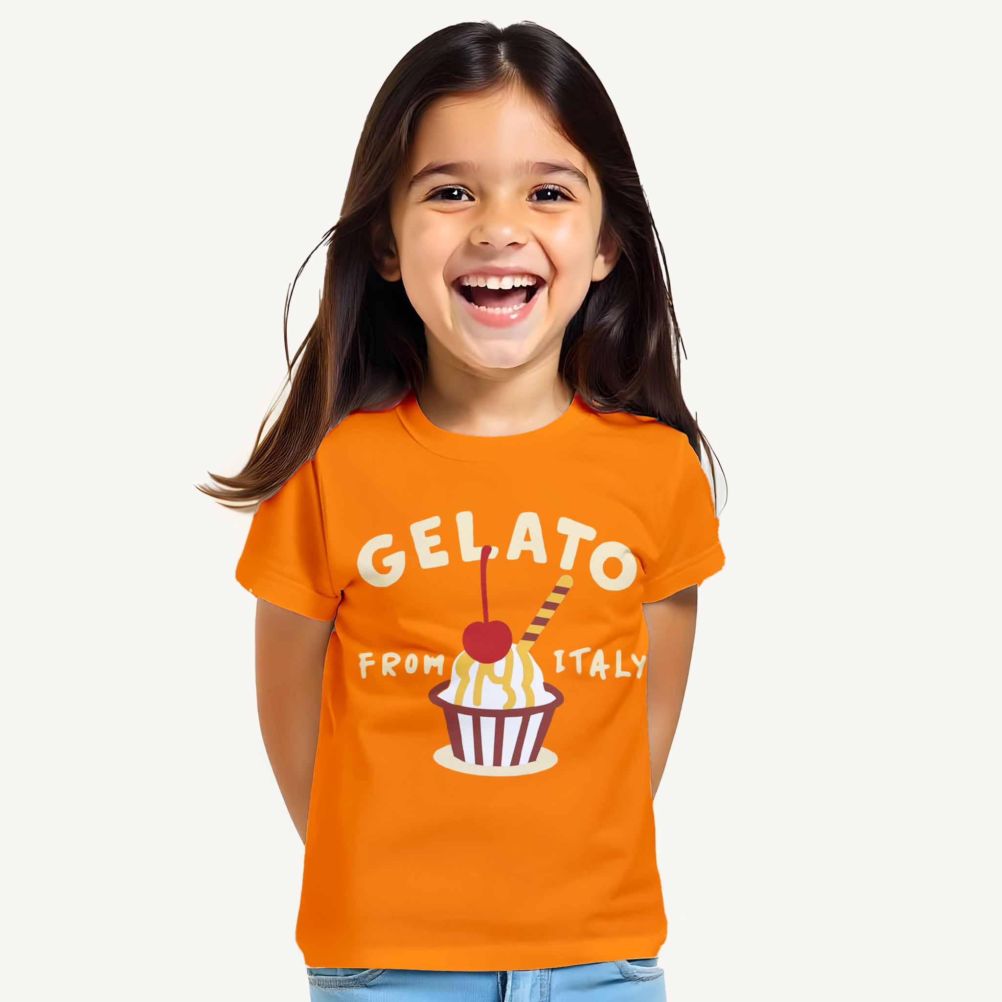 Child wearing an orange t-shirt with 'Gelato from Italy' design on a white background