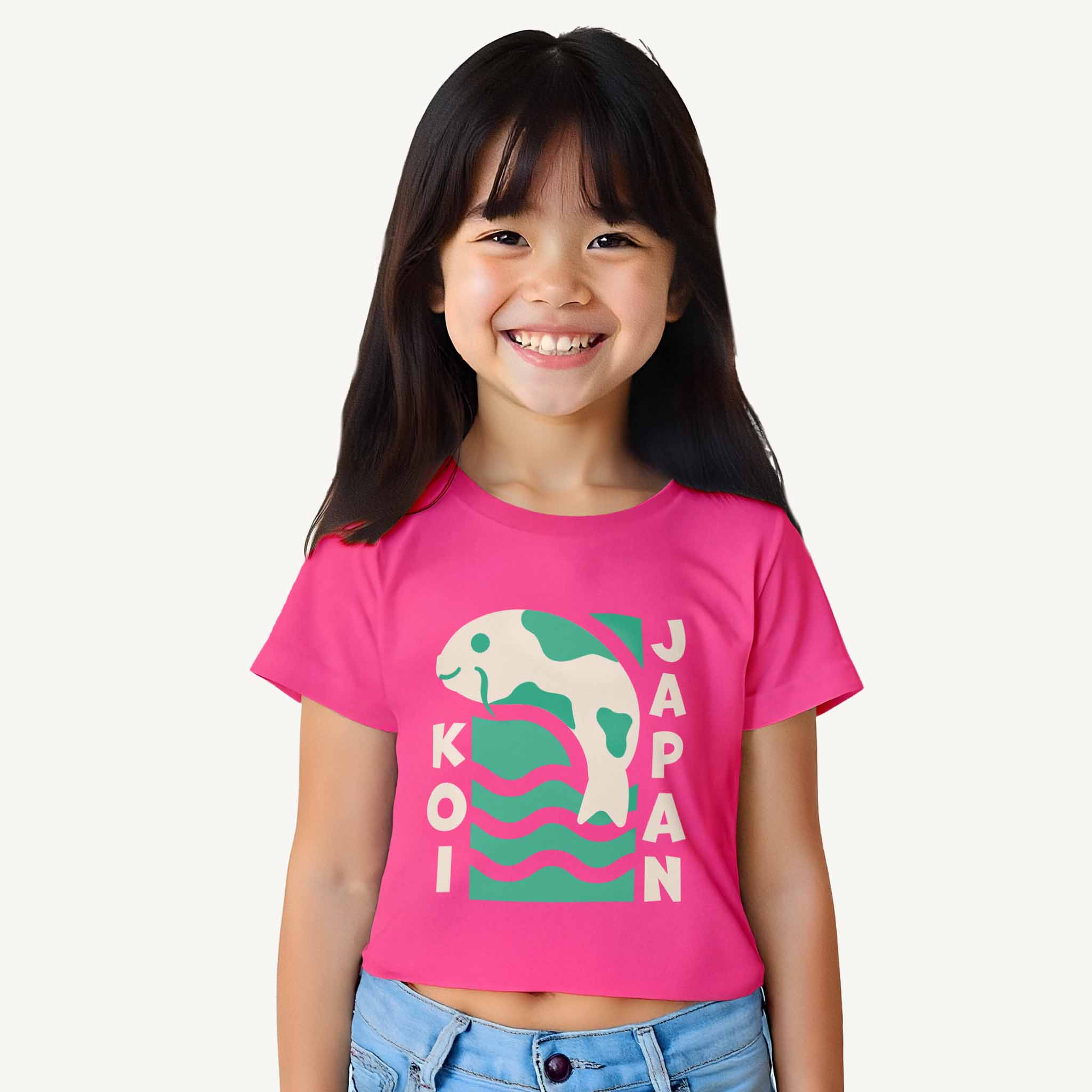 Child wearing a pink t-shirt with a graphic design on a white background