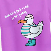 Purple shirt with a cartoon seagull wearing boots and a hat, and text on a purple background.