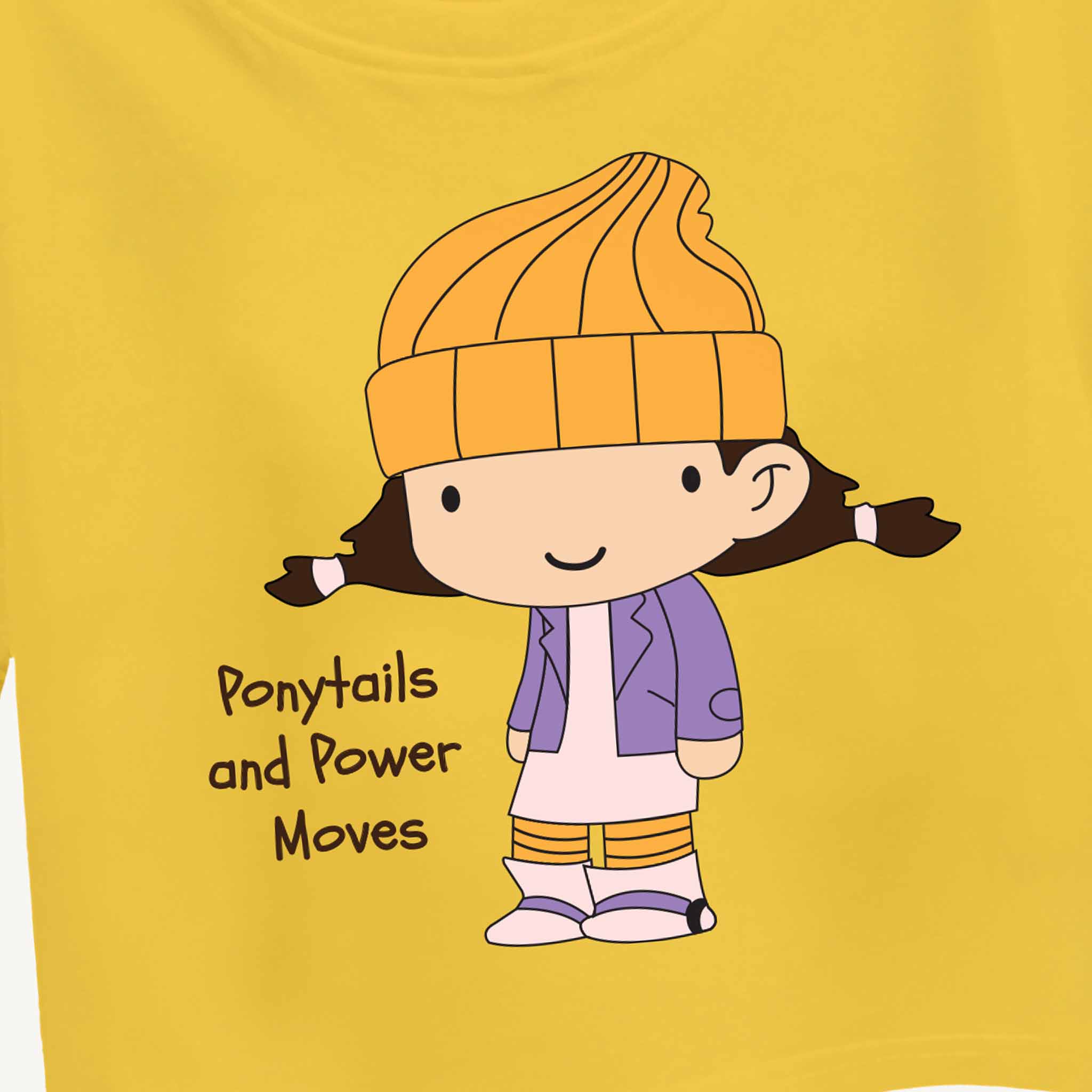 Yellow croptop with a cartoon character and text 'Ponytails and Power Moves' on a yellow background