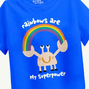 Blue t-shirt with a cartoon crab and rainbow design on a white background.