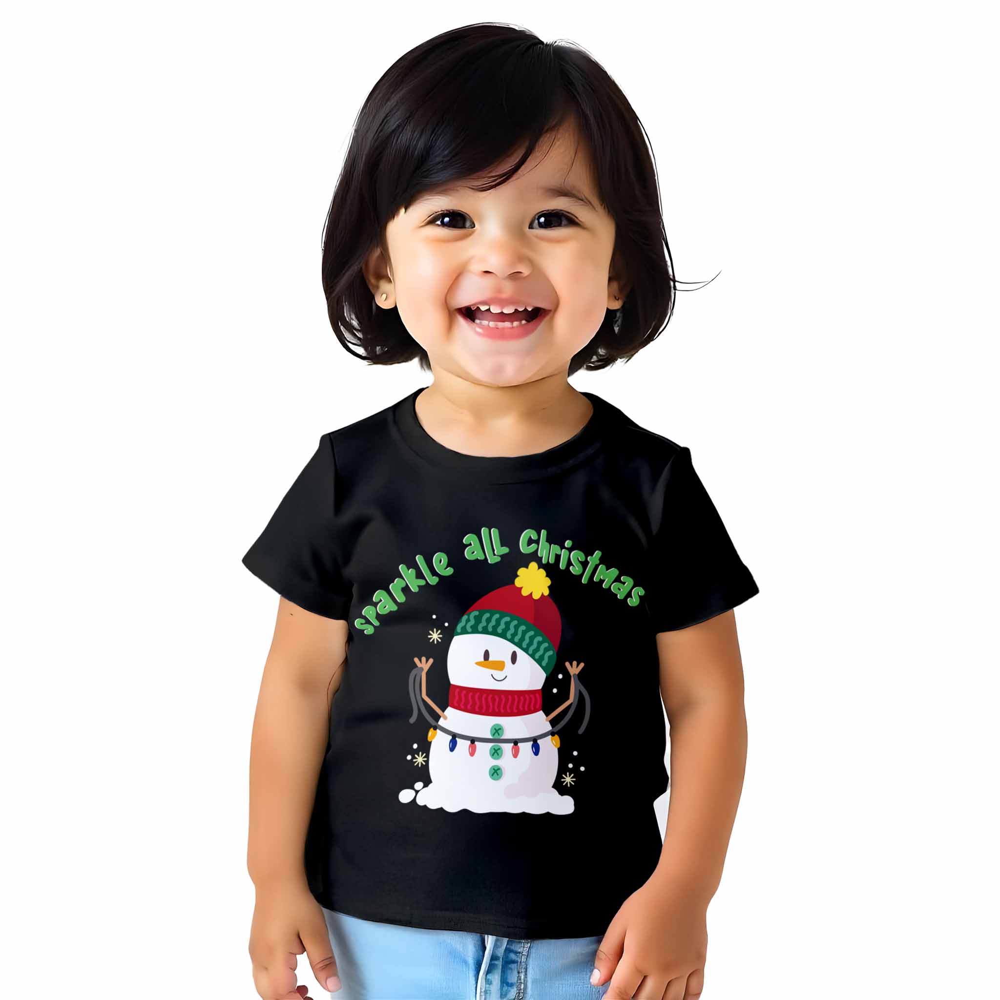 Child wearing a black t-shirt with a Christmas design on a white background
