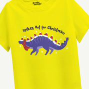 Yellow t-shirt with a purple dinosaur wearing Santa hats and text 'Spikes Out for Christmas!' on a white background.