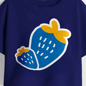 Close-up of strawberry print on navy blue cotton crop top for girls | Guugly Wuugly