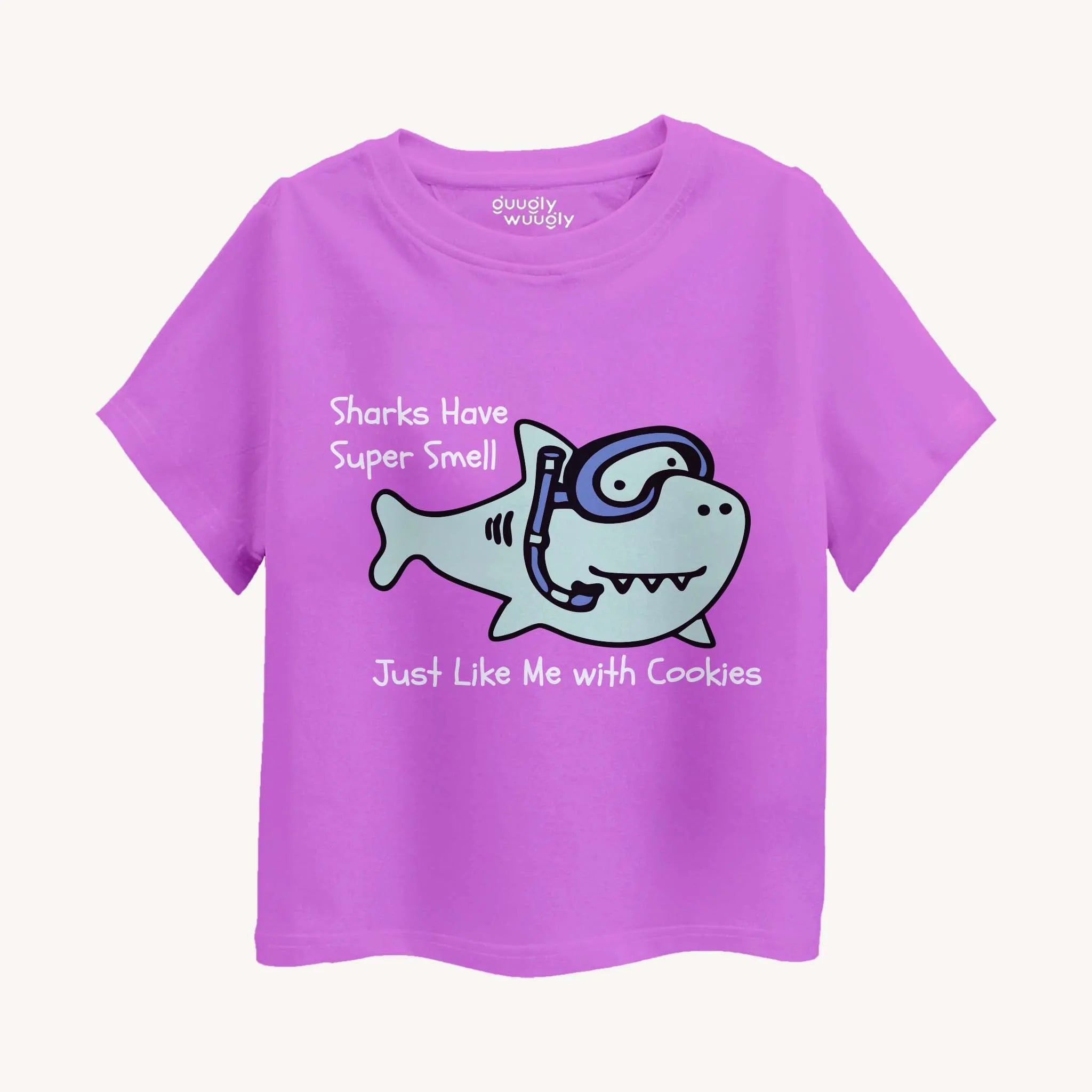 lavender t-shirt with a cartoon shark and text on a white background