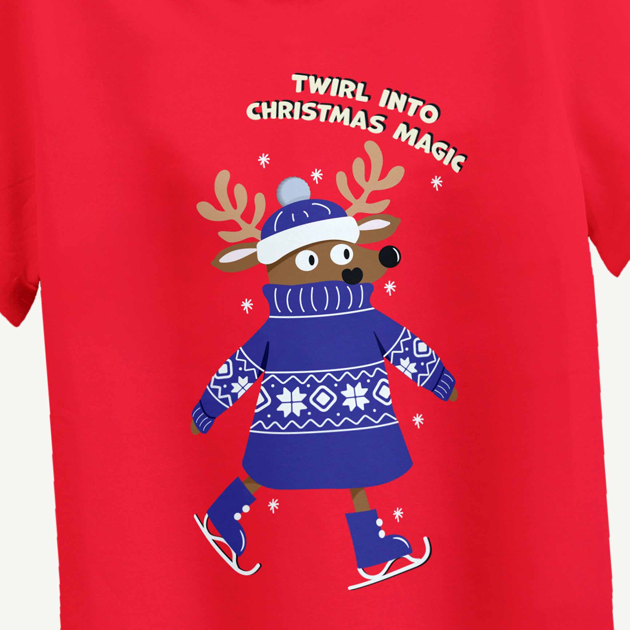 Red t-shirt with a reindeer design and text 'Twirl into Christmas Magic' on a red background