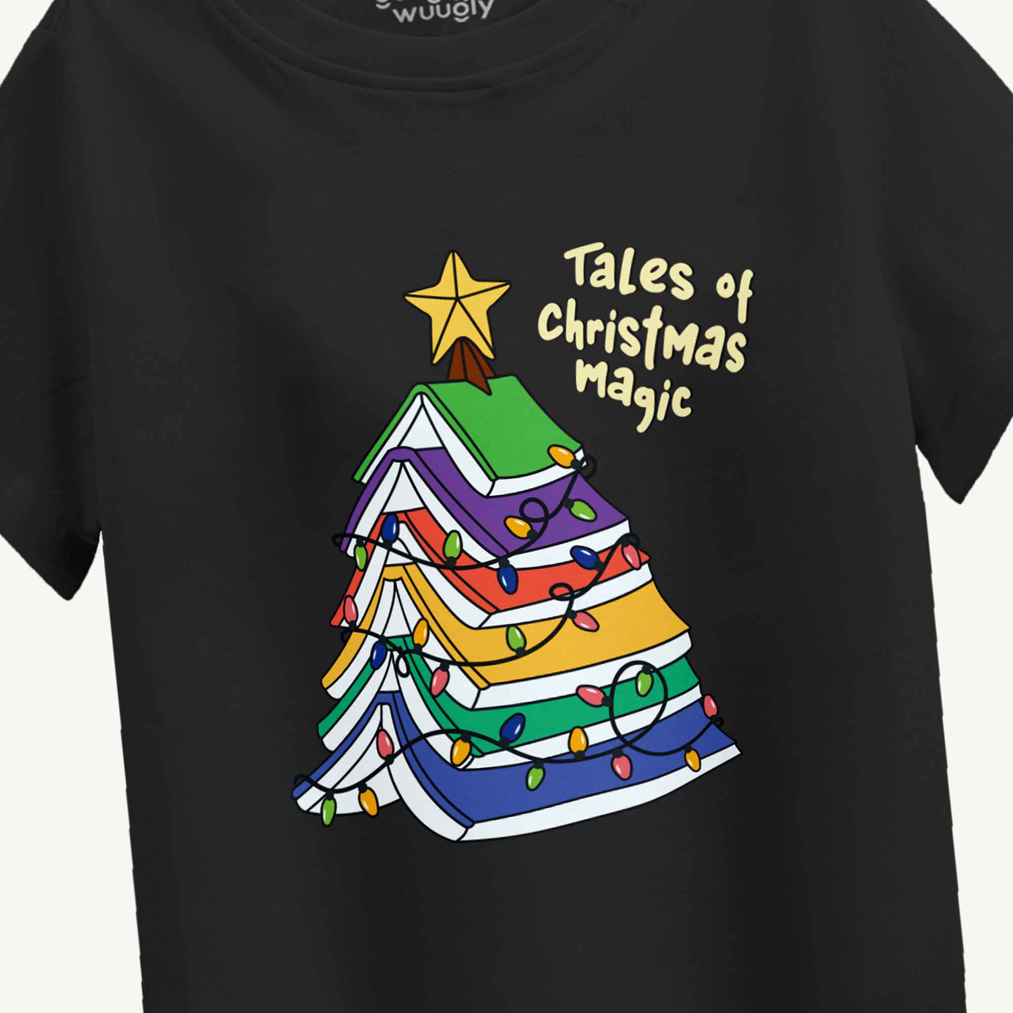 Black t-shirt with a colorful Christmas tree design and 'Tales of Christmas Magic' text.